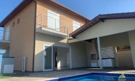 Casa em Condomínio de Luxo à Venda em Morada da Praia, Bertioga/SP: 3 Quartos, 3 Suítes, Piscina e Área Gourmet!