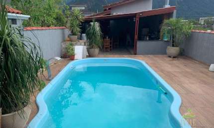 Casa a venda  Morada da Praia - Bertioga - SP: 3 quartos, 2 suítes, piscina e churrasqueira!