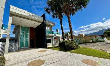 IMÓVEL DE ALTO PADRÃO A VENDA NO MORADA DA PRAIA - BERTIOGA/SP: Casa de Luxo com 5 Quartos, 4 Suítes e 6 Vagas de Garagem!