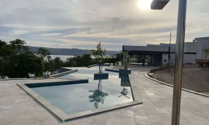 Casa em condomínio fechado com 3 quartos à venda na rua 1, Zona Rural, Rifaina por R$ 1.200.000