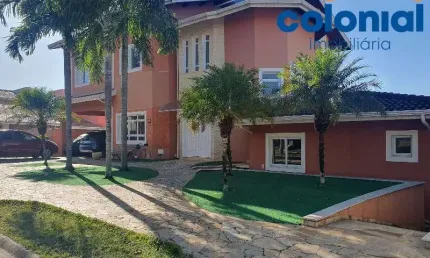 CASA NO CONDOMÍNIO TERRAS DO CARIBE EM VALINHOS COM  3 SUÍTES, ESCRITÓRIO, 6 BANHEIROS, PISCINA AQUECIDA, VISTA LIVRE, 4 VAGAS 350M².SANTA CRUZ,