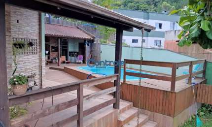 Casa com 4 quartos à venda na Rua Urucum, 4, Potecas, São José por R$ 900.000