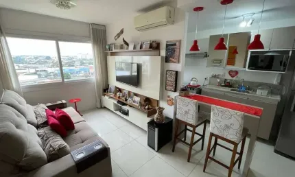Apartamento de 2 Dormitórios, suíte, churrasqueira e 2 vagas.