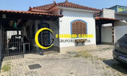 Casa em brás de pina com quintal e vagas de garagem