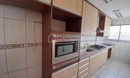Apartamento com 3 dormitórios para alugar,  por R$ 1.300,00/mês - Vila Belvedere - Americana/SP