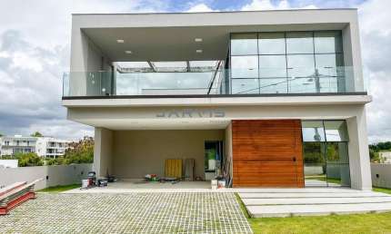 Casa com 4/4 à venda no Condomínio Atlantis, em Garça Torta.