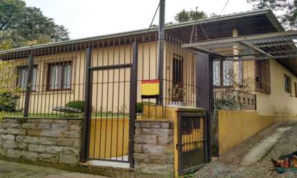 Casa com 4 quartos à venda na Honduras, 31, Jardim América, Caxias do Sul por R$ 689.000