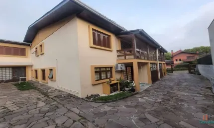 Casa em condomínio fechado com 3 quartos à venda no Jardim América, Caxias do Sul  por R$ 460.000