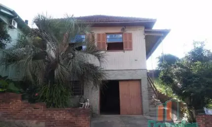 Casa com 4 quartos à venda no Rio Branco, Caxias do Sul  por R$ 450.000