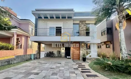 Casa em condomínio fechado com 3 quartos à venda na Avenida AlphaVille, 2745, Alphaville, Gravataí por R$ 2.390.000
