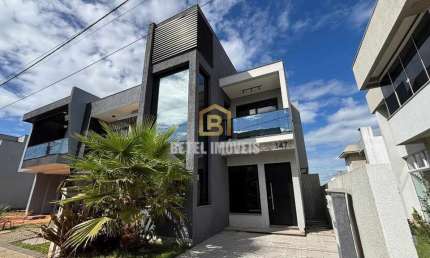 Casa em condomínio fechado com 3 quartos à venda na Rua Tancredo Neves, 990, Jansen, Gravataí por R$ 950.000