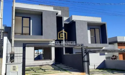 Casa com 3 quartos à venda na Rubem Fonseca Vargas, 120, Dom Feliciano, Gravataí por R$ 549.900