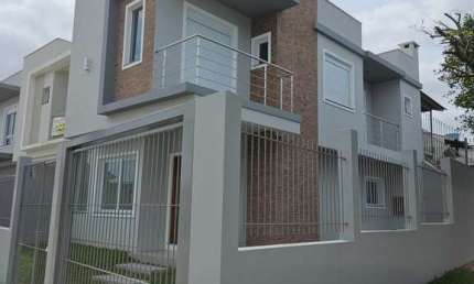 Casa com 3 quartos à venda na Rua Érico Veríssimo, 53, Nossa Senhora das Graças, Canoas, 205 m2 por R$ 780.000