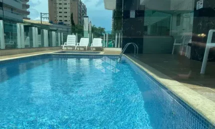 apartamento a venda na praia grande, bairro caiçara com 2 quartos, 1 suite e 1 vaga
