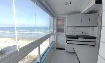 apartamento a venda na praia grande, no bairro real, com 2 quartos 1 suite e 1 vaga.