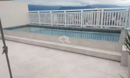Apartamento a venda na praia grande, bairro caiçara, com 2 quartos e 1 vaga