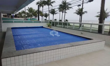 Apartamento a vista na praia grande, bairro real, com 2 quartos 1 suite e uma vaga
