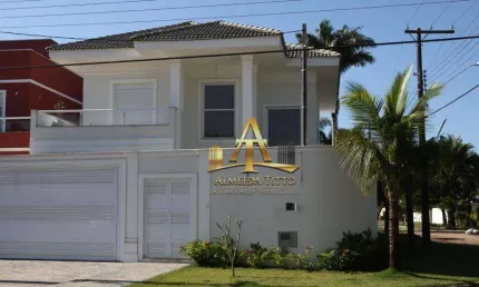 Casa com 4 dormitórios à venda, 300 m² por R$ 1.826.000,00 - Balneário Praia do Pernambuco - Guarujá/SP