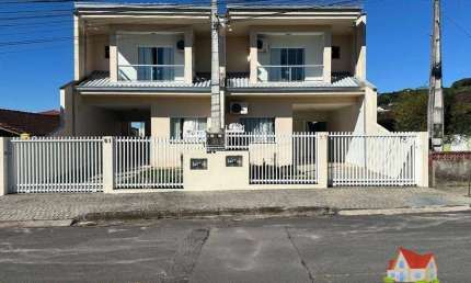 Sobrado Geminado C/Area de 112 m2 C/03 Quartos C/Suite + Espaco aos Fundos + 02 Vagas de Garagem No Aventureiro!