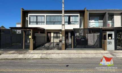 Sobrado Geminado C/115 m2 C/03 Quartos C/Suite + Area C/Churrasq. + 02 Vagas de Garagem No Jardim Iririu!