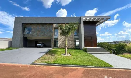 Casa com 4 dormitórios à venda, 553 m² por R$ 3.890.000,00 - Condomínio Costa do Sol - Rolândia/PR