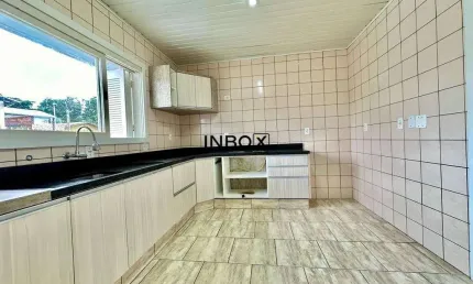 INBOX CIA IMOBILIÁRIA VENDE EM BENTO GONÇALVES - Casa com duas moradias averbada no Santa Helena.