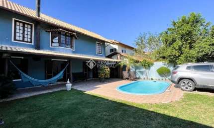 Casa com 3 quartos à venda na Servidão Dunas da Joaquina, 254, Rio Tavares, Florianópolis, 228 m2 por R$ 2.280.000