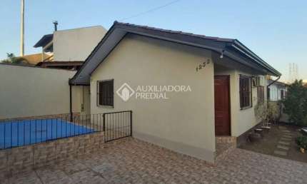 Casa com 2 quartos para alugar na Rua Canários, 1232, Jardim Algarve, Alvorada, 68 m2 por R$ 2.690