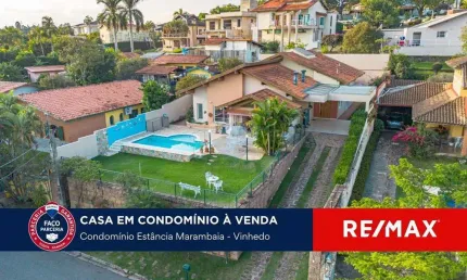 Vende-se casa  térrea, com 3 suítes, piscina, sauna e  escritório no condomínio Marambaia - Vinhedo.