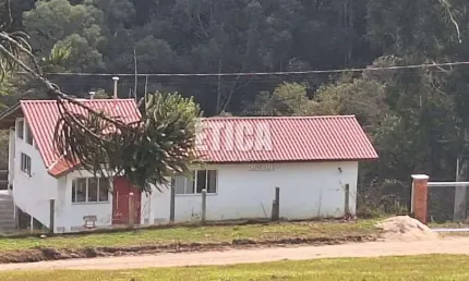 Casa em condomínio fechado com 3 quartos à venda na Rua Wenceslau Hubner, s/nº, Centro, Campo do Tenente, 134 m2 por R$ 1.100.000