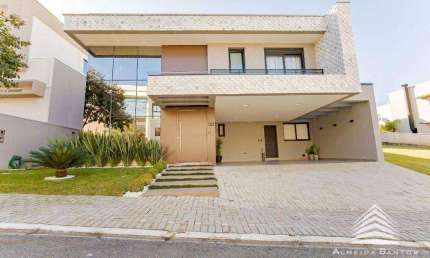 Casa a venda em Santa Felicidade, em condomínio clube Alto Padrão em Santa Felicidade, 03 suítes e 03 vagas de garagem.