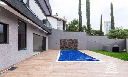 Casa a venda no Campo Comprido, 3 suítes, 4 vagas de garagem, com piscina aquecida e espaço gourmet com churrasqueira
