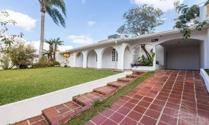 Casa com 3 dormitórios à venda, 320 m² por R$ 1.980.000  - Curitiba