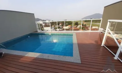 Oportunidade Única em Ubatuba: Área com Vista para o Mar, 2 Suítes e Financiamento Facilitado!