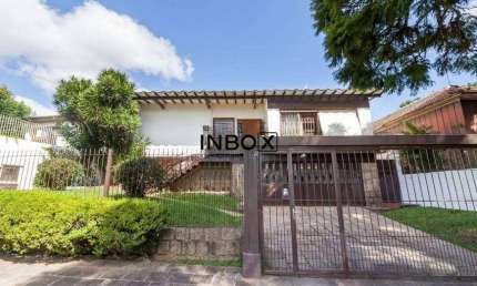 Casa com 370m² e 3 dormitórios no bairro Chácara das Pedras em Porto Alegre para Comprar ou Alugar