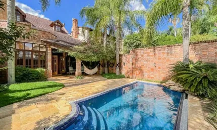 Casa com 4 quartos à venda na Rua Estácio de Sá, 893, Chácara das Pedras, Porto Alegre
