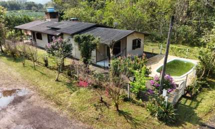 Casa com 3 quartos à venda na vereador Flavio Dalpiaz, Centro, Maquiné por R$ 420.000