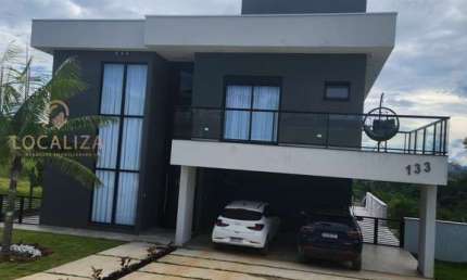 Luxuosa casa à venda em Jacareí-SP, Jardim Nova Esperança: 3 quartos, 3 suítes, 3 salas, 9 vagas, 450m². Venha conferir!