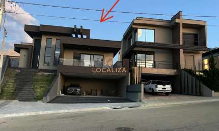 Casa à venda em Caçapava-SP, Residencial Colinas: 3 suítes, área de lazer, 4 vagas. Aproveite essa oportunidade única!