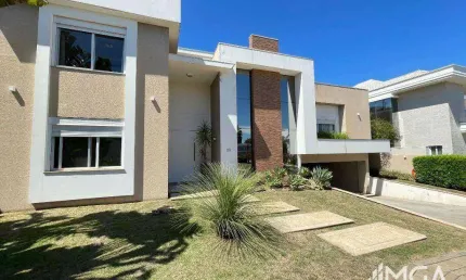 Sobrado com 5 dormitórios à venda, 485 m² por R$ 4.150.000,00 - Condomínio Iguassu Green Village - Foz do Iguaçu/PR