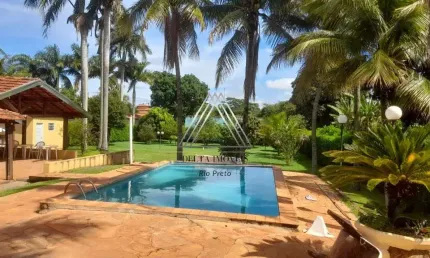 Chácara de luxo em condomínio: 2 quartos, 1 sala, 2 banheiros, 5 vagas, 195m². Guapiaçu-SP, Condomínio Monte Carlo.