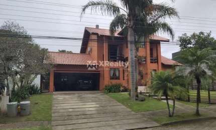 Casa em condomínio fechado com 4 quartos à venda na Rodovia Doutor Antônio Luiz Moura Gonzaga, 647, Rio Tavares, Florianópolis por R$ 4.500.000