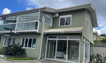 Casa em condomínio fechado com 3 quartos à venda na Rodovia Jornalista Manoel de Menezes, 2201, Barra da Lagoa, Florianópolis por R$ 1.600.000