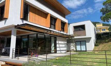 Casa em condomínio fechado com 4 quartos à venda na Rodovia Doutor Antônio Luiz Moura Gonzaga, 647, Rio Tavares, Florianópolis por R$ 6.990.000