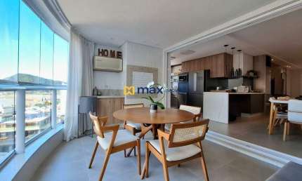 Excelente apartamento semi mobiliado, alto padrão com 3 suítes e vista mar à venda no bairro Fazenda em Itajaí