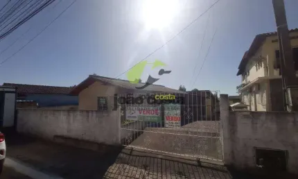 Casa com 2 dormitórios à venda, 65 m² por R$ 371.000,00 - Praia de Fora - Palhoça/SC
