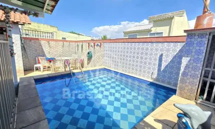 Maravilhosa casa triplex com área gourmet e piscina Moneró