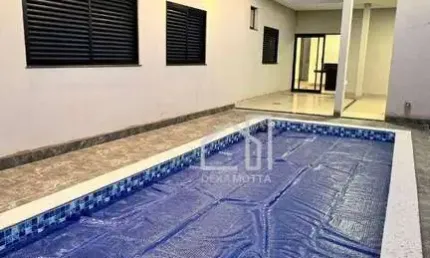 Casa com 3 dormitórios à venda, 150 m² por R$ 1.100.000,00 - Aclimação - Uberlândia/MG