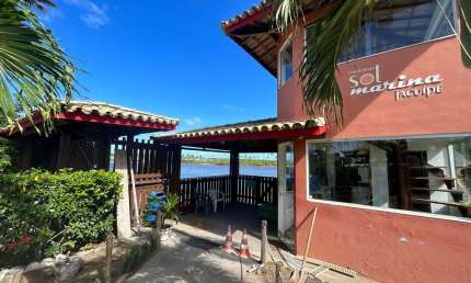 Casa em condomínio fechado com 3 quartos à venda na Barra do Jacuípe, Camaçari  por R$ 699.000