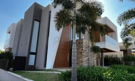 Casa à venda com 4 suítes no Alphaville Dom Pedro 3, Campinas.